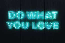 do what you love blue neon words
